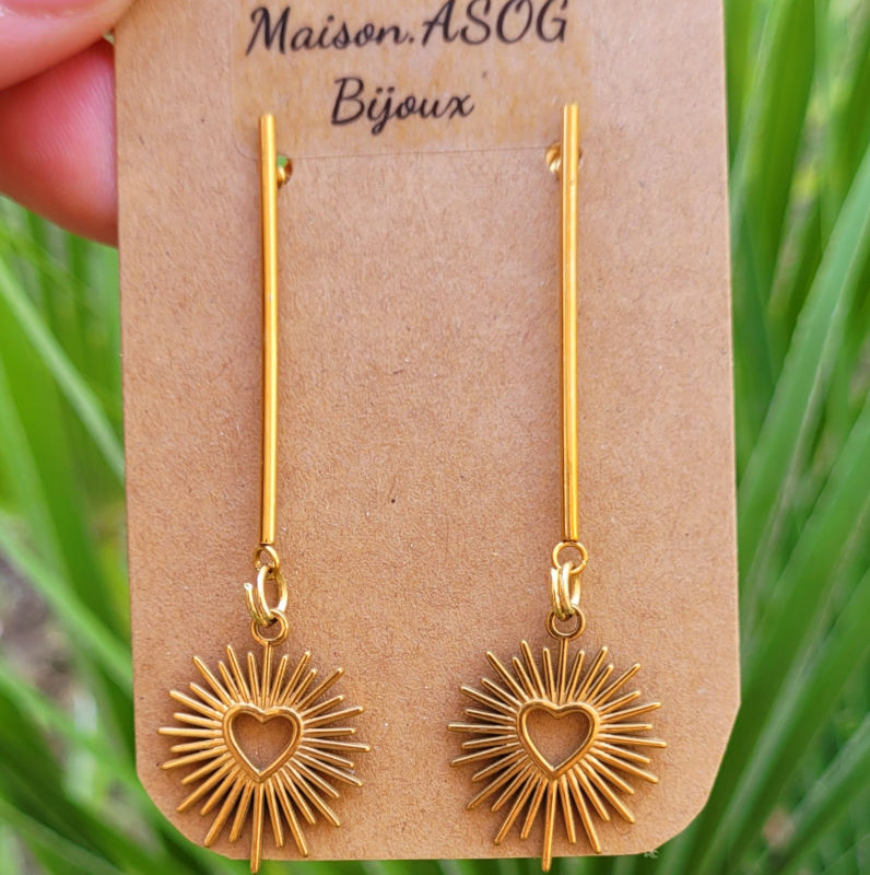 Boucles d'oreilles clou avec tige et soleil en acier doré