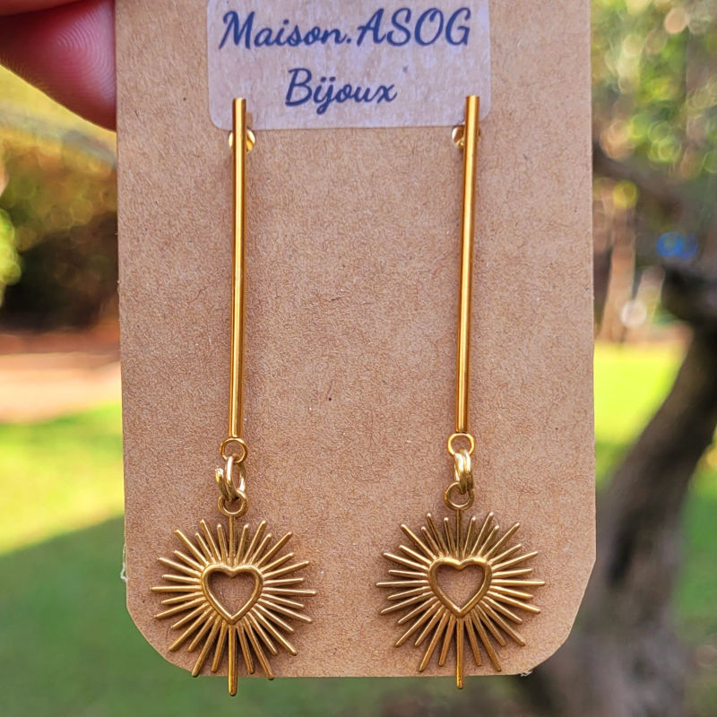 Boucles d'oreilles clou avec tige et soleil en acier doré