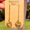 Boucles d'oreilles clou avec tige et soleil en acier doré