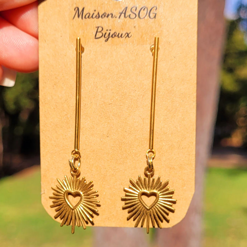 Boucles d'oreilles clou avec tige et soleil en acier doré
