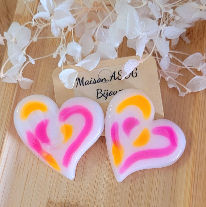 Boucles d'oreilles Anna orange et rose fluo sur fond blanc
