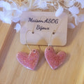 Boucle d'oreille créole dorée Coeur asymétrique rose pailleté rosé cuivré