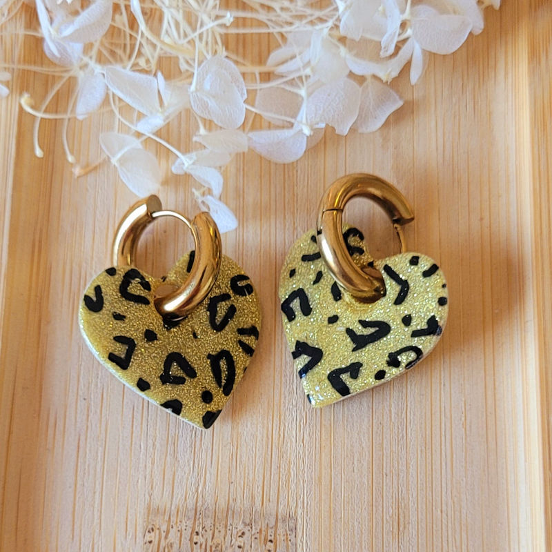 Boucles d'oreille Créole dorée pampille Coeur réversible Léopard doré noir et pailleté doré