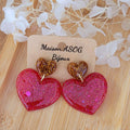 Boucles d'oreilles Cathie coeur doré et rose fushia pailleté