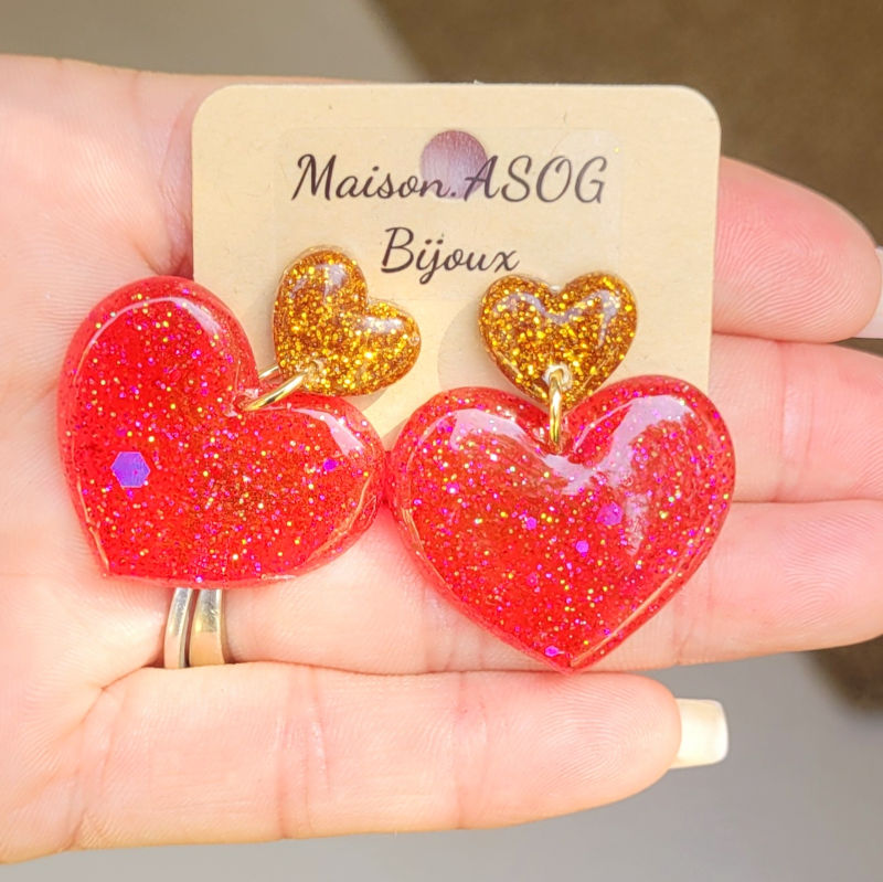 Boucles d'oreilles Cathie coeur doré et rose fushia pailleté