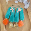 Boucles d'oreilles Roman bleu orange paillette dorée holographique