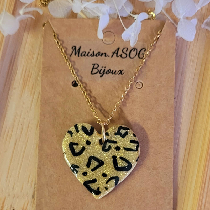 Collier chaîne dorée pampille Coeur léopard doré et noir