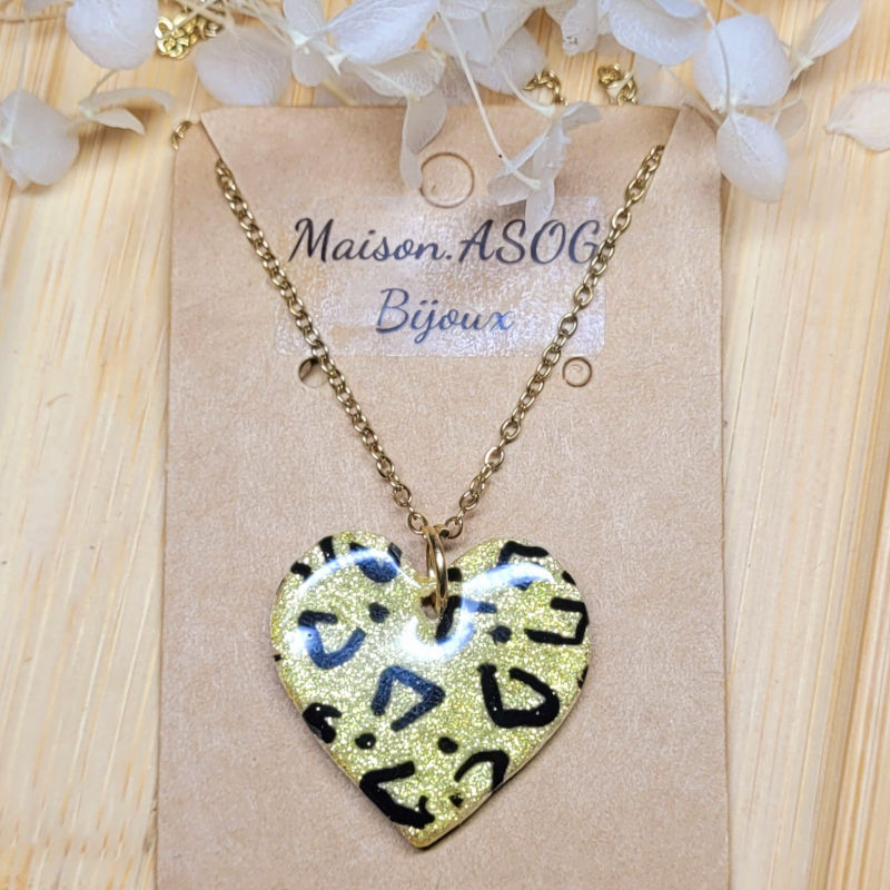 Collier chaîne dorée pampille Coeur léopard doré et noir