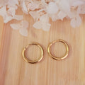 Boucles d'oreilles créole dorée et pampille Donut's réversible blanc avec éclat doré et paillette dorée
