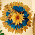 Jujuhat l'Oasis Doré en plume naturelle doré bleu azur beige poudré et sa palme et feuillage doré